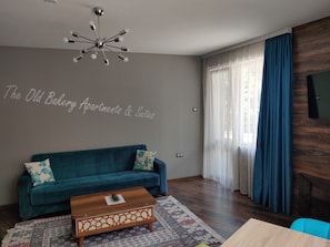 Appartement Standard, 1 chambre (A2) | Coin séjour | Télévision à écran plat