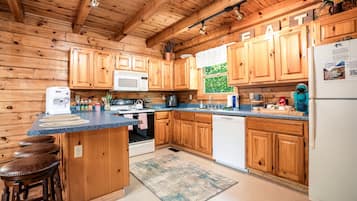 Cabin, 2 Bedrooms | Private kitchen | Microwave, dishwasher, coffee/tea maker, toaster