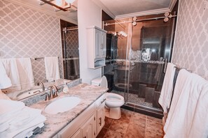 Combined shower/bathtub, hair dryer, towels, soap