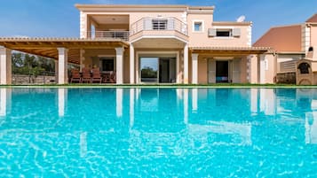 Outdoor pool, pool umbrellas, pool loungers