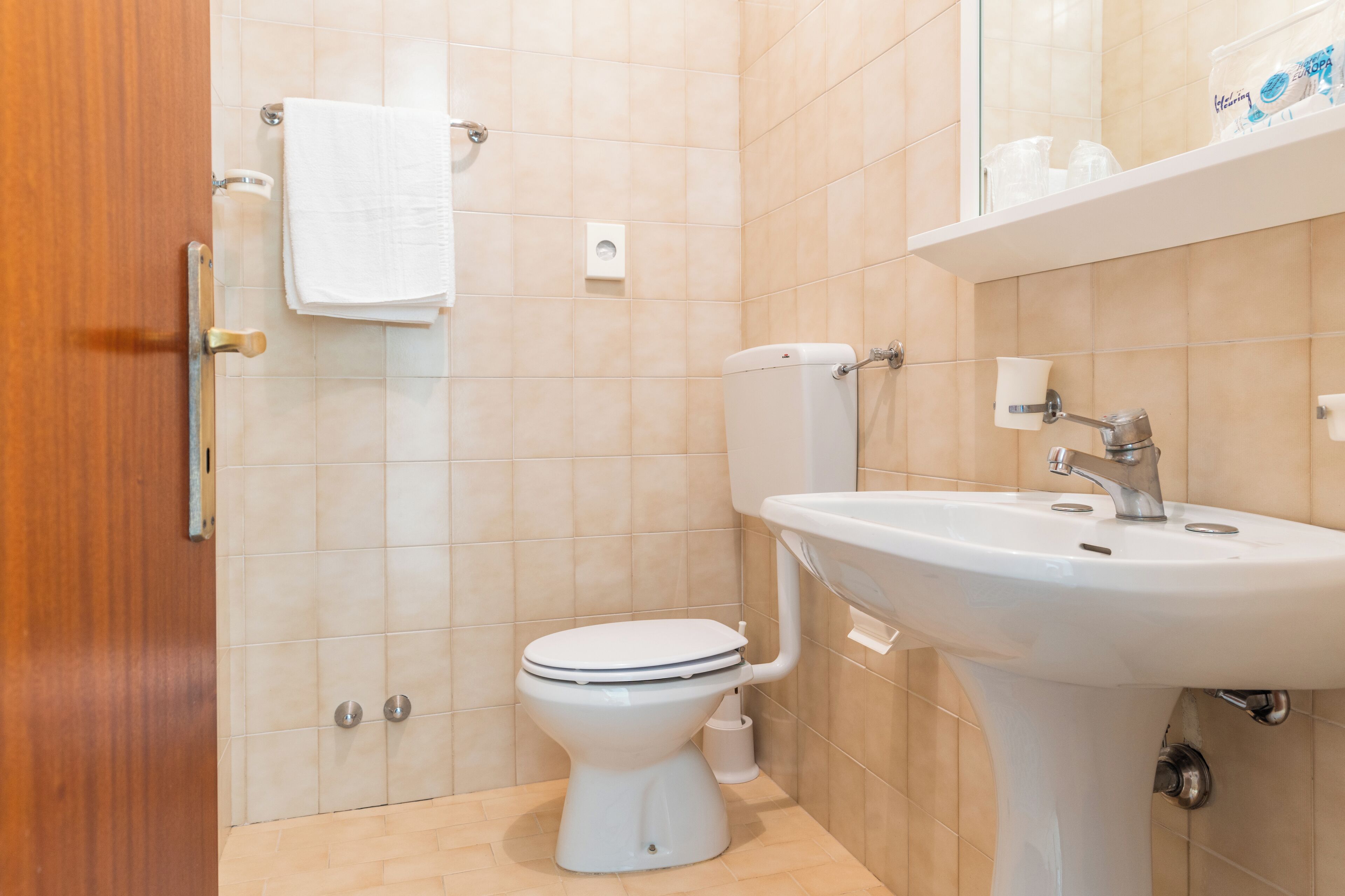 single room | bathroom | shower, hair dryer, towels, soap