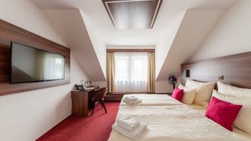 Ropa de cama de alta calidad y minibar