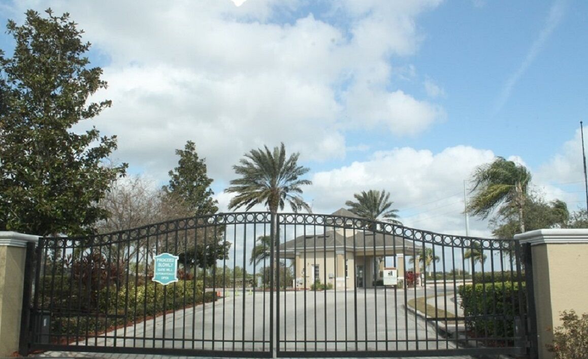 A gated entrance with a sign indicating a private area.