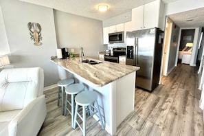 Condo, 1 Bedroom | Private kitchen | Fridge, microwave, oven, dishwasher