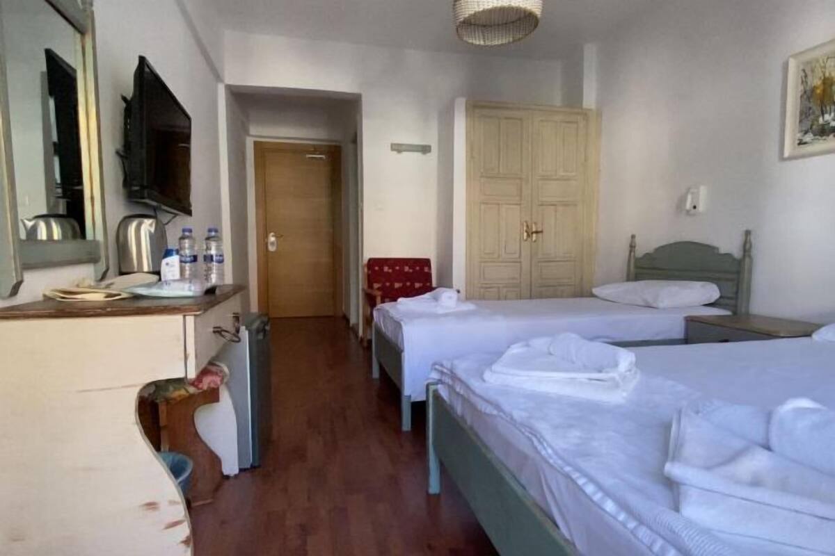 2 bedrooms, blackout curtains, soundproofing, iron/ironing board