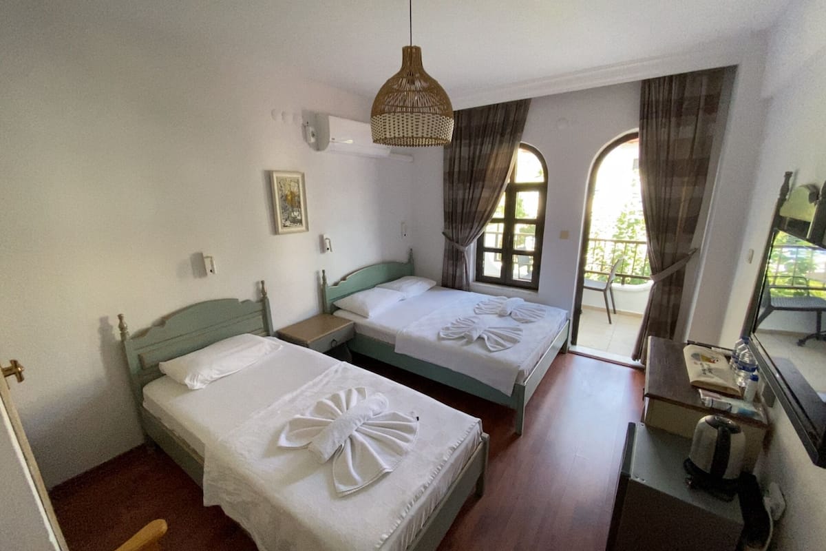 2 bedrooms, blackout curtains, soundproofing, iron/ironing board