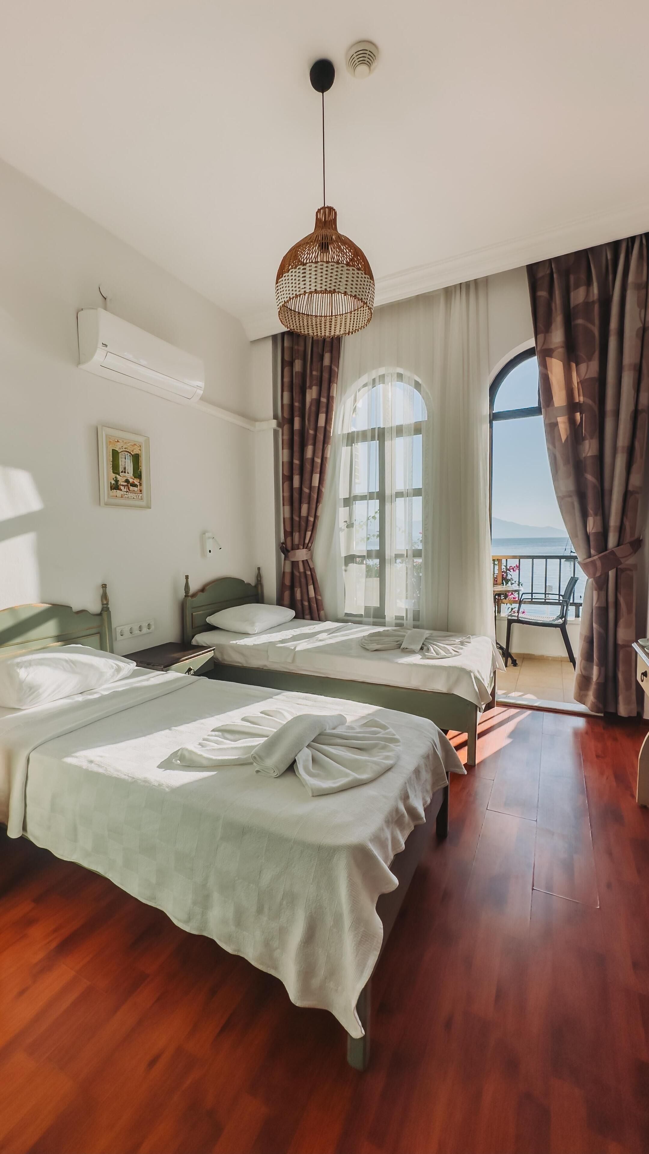 패밀리 스위트, 바다 전망, 바다 정면 | 암막 커튼, 방음 설비, 다리미/다리미판, 무료 WiFi