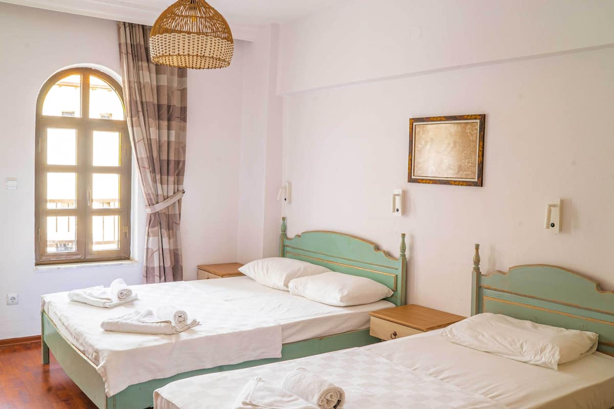 2 bedrooms, blackout curtains, soundproofing, iron/ironing board