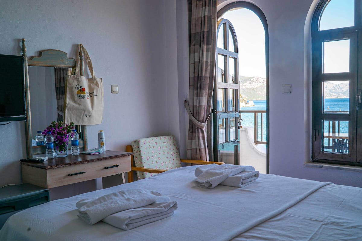 2 bedrooms, blackout curtains, soundproofing, iron/ironing board