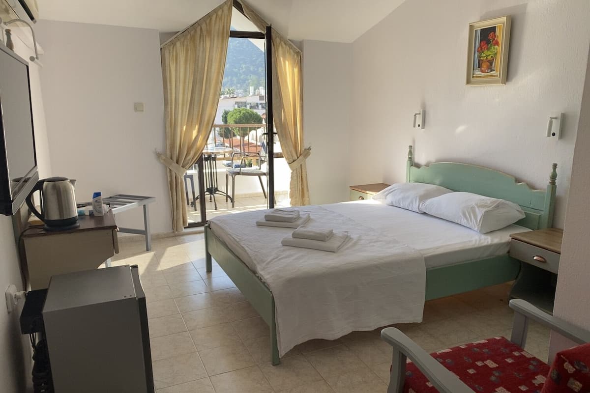 2 bedrooms, blackout curtains, soundproofing, iron/ironing board