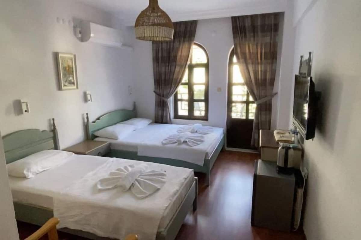 2 bedrooms, blackout curtains, soundproofing, iron/ironing board