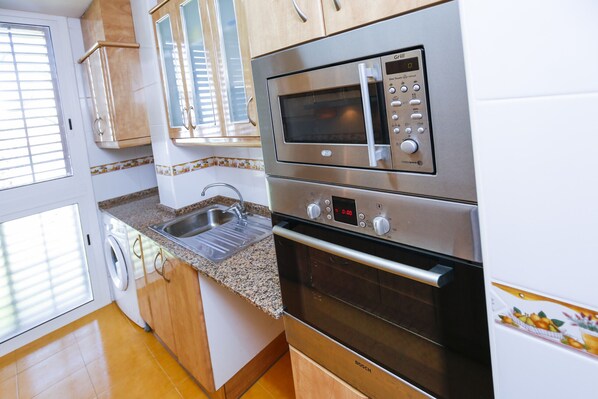 Fridge, microwave, oven, coffee/tea maker
