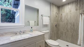 Shower, hair dryer, towels, soap