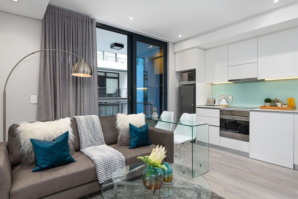 Comfort Apartment | Living area | Flat-screen TV - 35 On Main 202 (Cape Town)