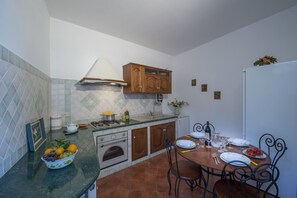 Villa, 2 Bedrooms | Private kitchen | Full-sized fridge, microwave, oven, stovetop