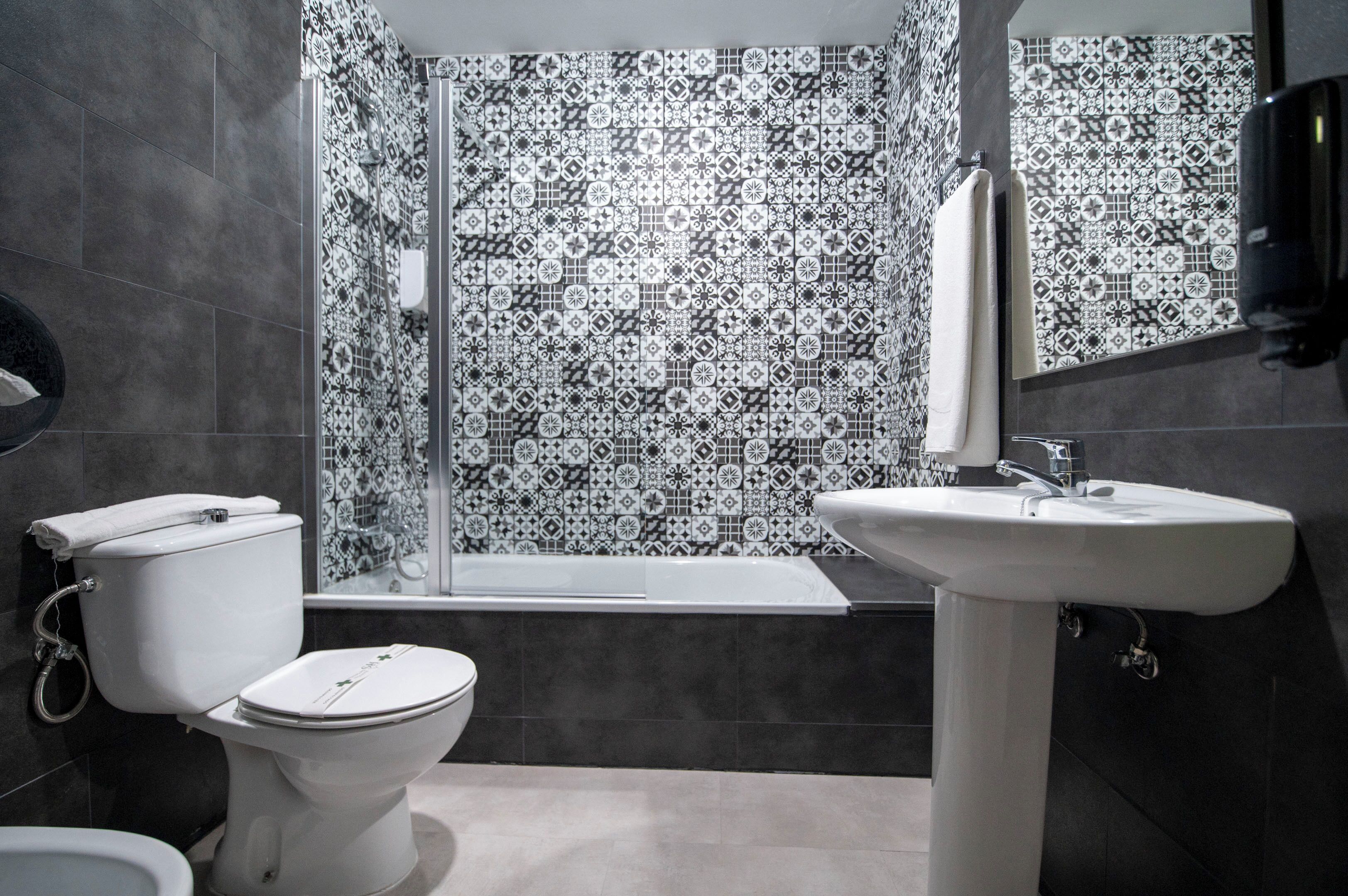 double or twin room | bathroom | hair dryer, towels, soap, shampoo