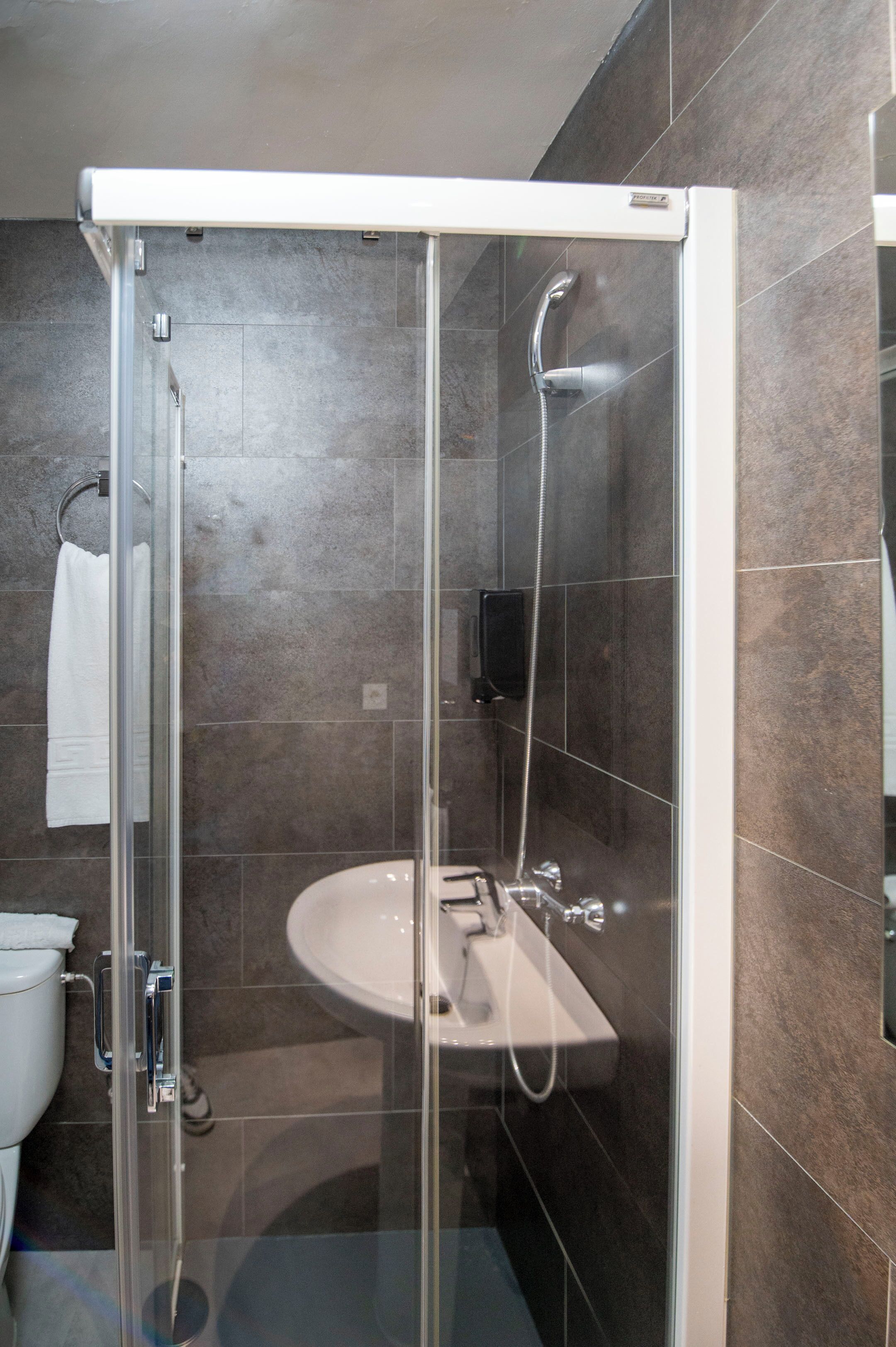 single room | bathroom | hair dryer, towels, soap, shampoo