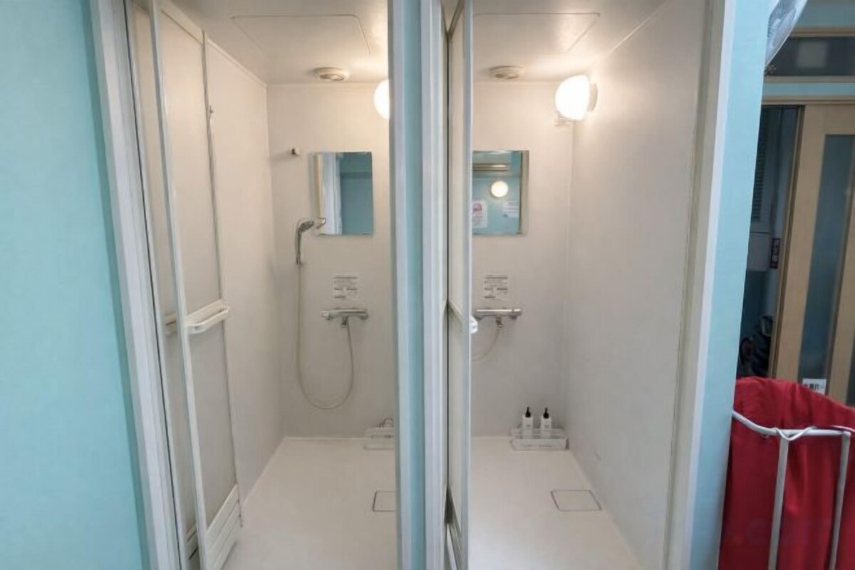 Bathroom | Combined shower/tub, jetted tub, hair dryer, slippers