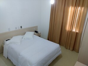 Habitación ejecutiva | Minibar, cortinas opacas, wifi gratis y ropa de cama