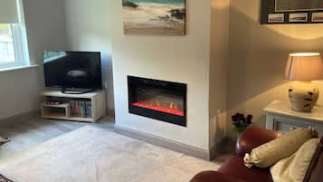 30-inch TV with digital channels, fireplace