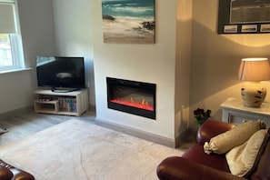 30-inch TV with digital channels, fireplace