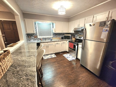 "Charming 3-Bedroom Home with Private Gym in Prime Neighborhood!"