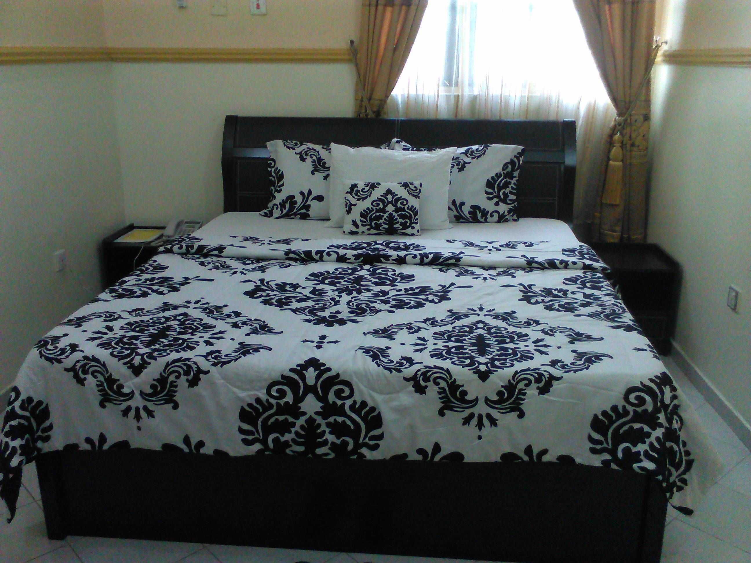 Desk, laptop workspace, free WiFi, bed sheets