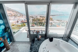 Rooftoop 2+1 Orablance | Baño | Tina con regadera, tina de hidromasaje, regadera tipo lluvia