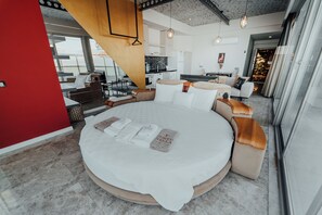 Rooftoop Balayi Suiti | Living area | 120-cm LCD TV with satellite channels, TV, books - Fortunella Suites & Villas (Finike)