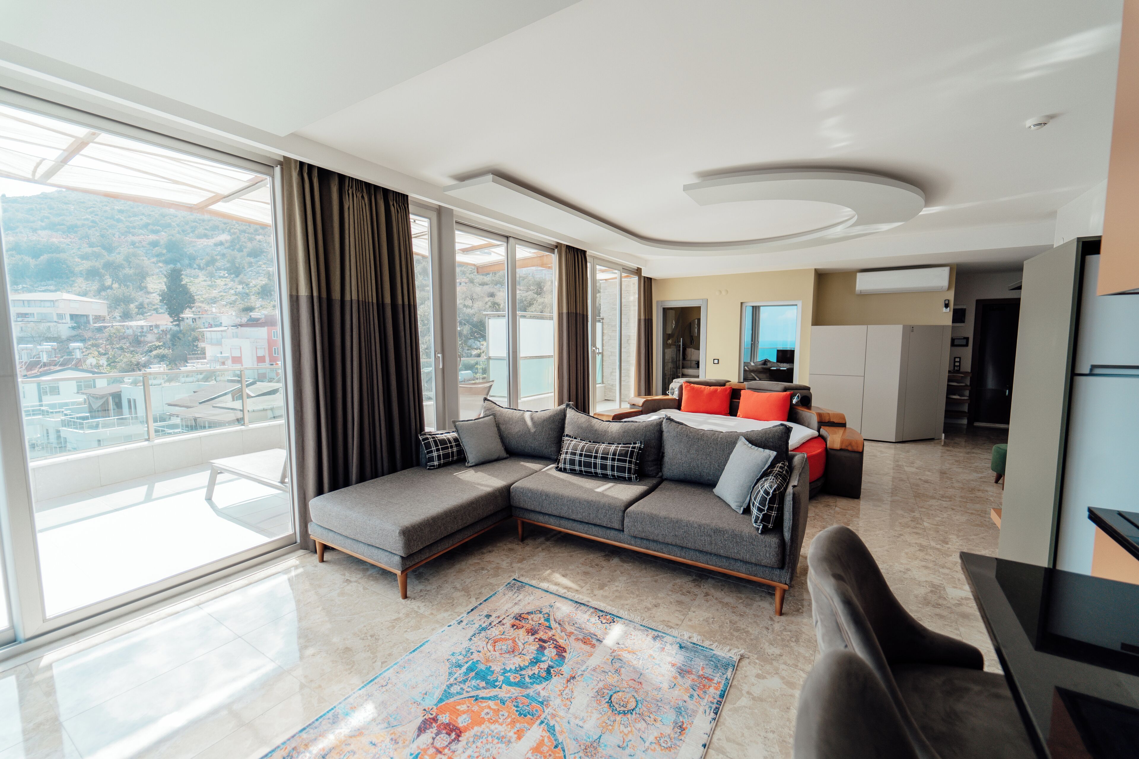 rooftoop balayi suiti | living area | 120-cm lcd tv with satellite channels, tv, books