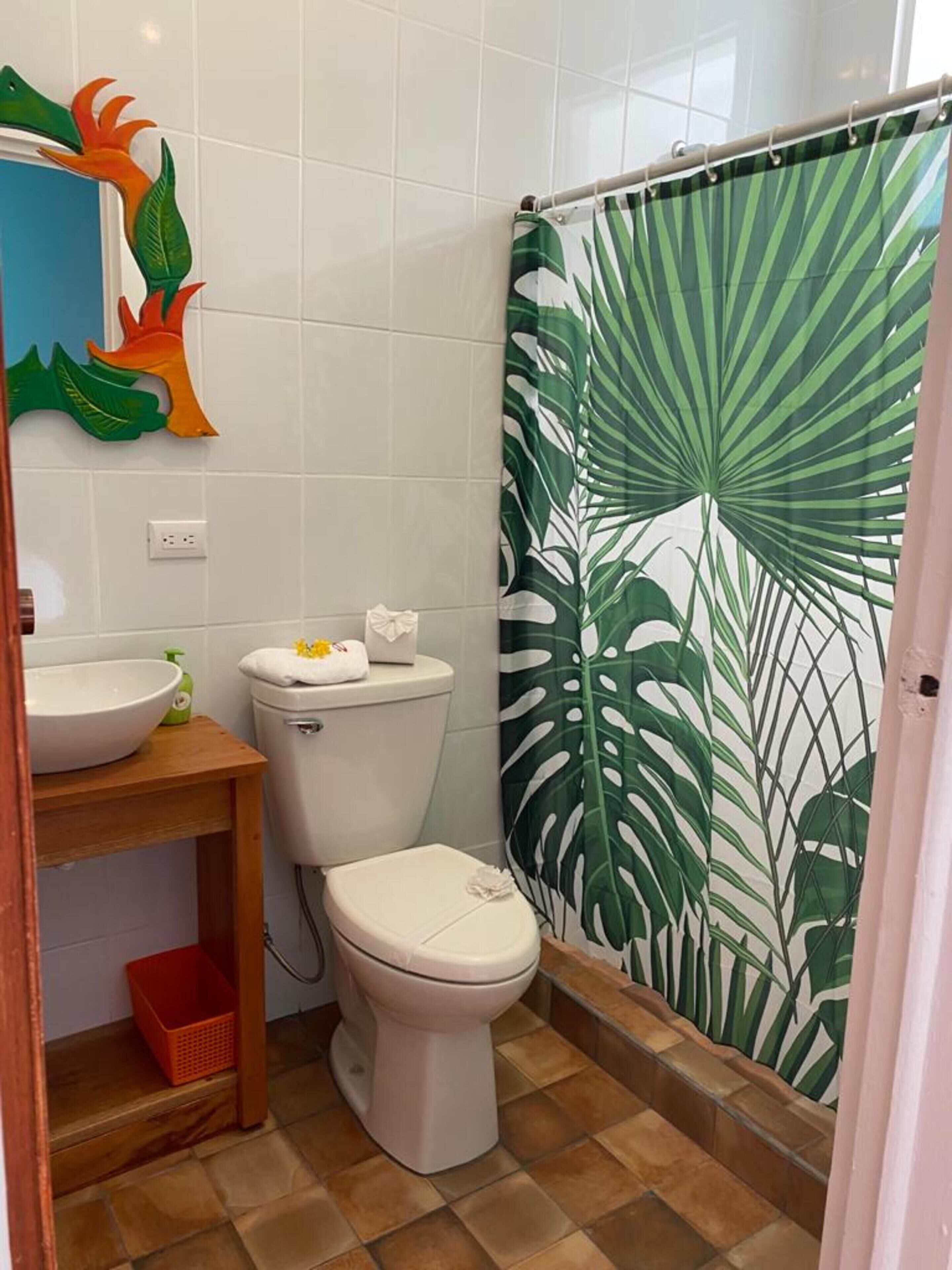 shower, eco-friendly toiletries, hair dryer, towels