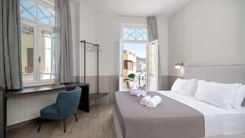 Suite ejecutiva, balcón | Ropa de cama de alta calidad y minibar