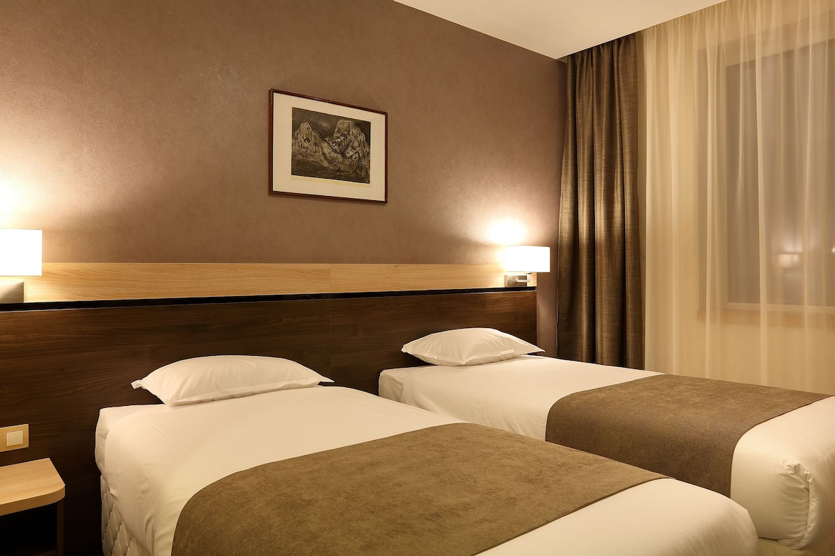 deluxe double room | premium bedding, minibar, desk, soundproofing