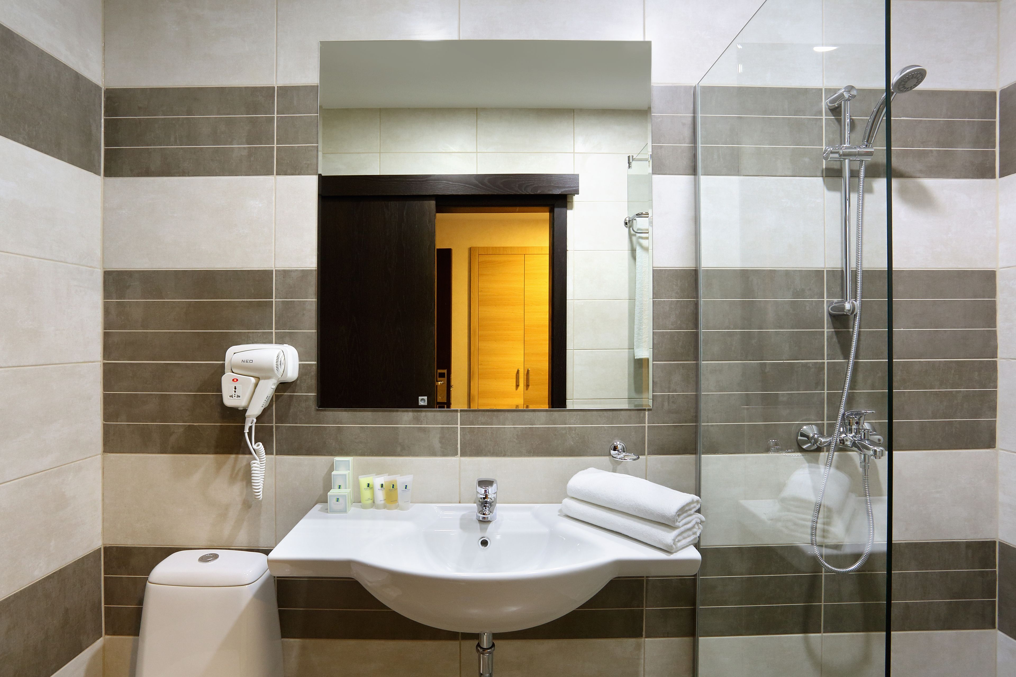 shower, free toiletries, hair dryer, slippers