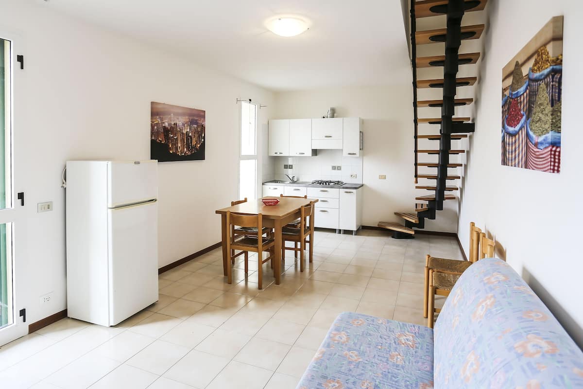 Comfort Duplex, 2 Bedrooms | Private kitchen | Fridge, stovetop, cookware/dishes/utensils