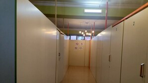 Dormitorio compartido Confort | Área de sala de estar