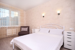 Departamento | Tabla de planchar con plancha, wifi gratis y ropa de cama 