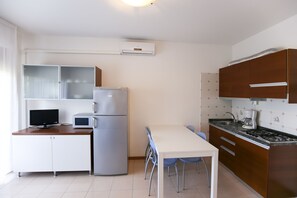Apartment, 1 Bedroom | Private kitchen | Full-size fridge, cookware/dishes/utensils - Residence Torcello (San Michele al Tagliamento)
