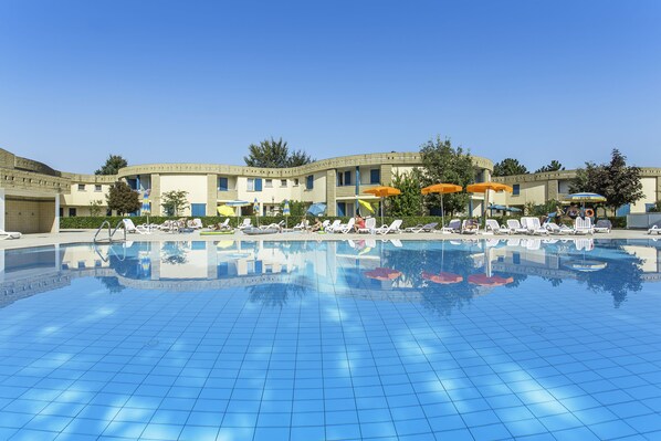 Seasonal outdoor pool, pool umbrellas, pool loungers