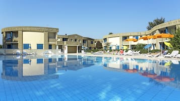 Seasonal outdoor pool, pool umbrellas, pool loungers