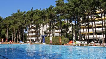 Seasonal outdoor pool, pool loungers