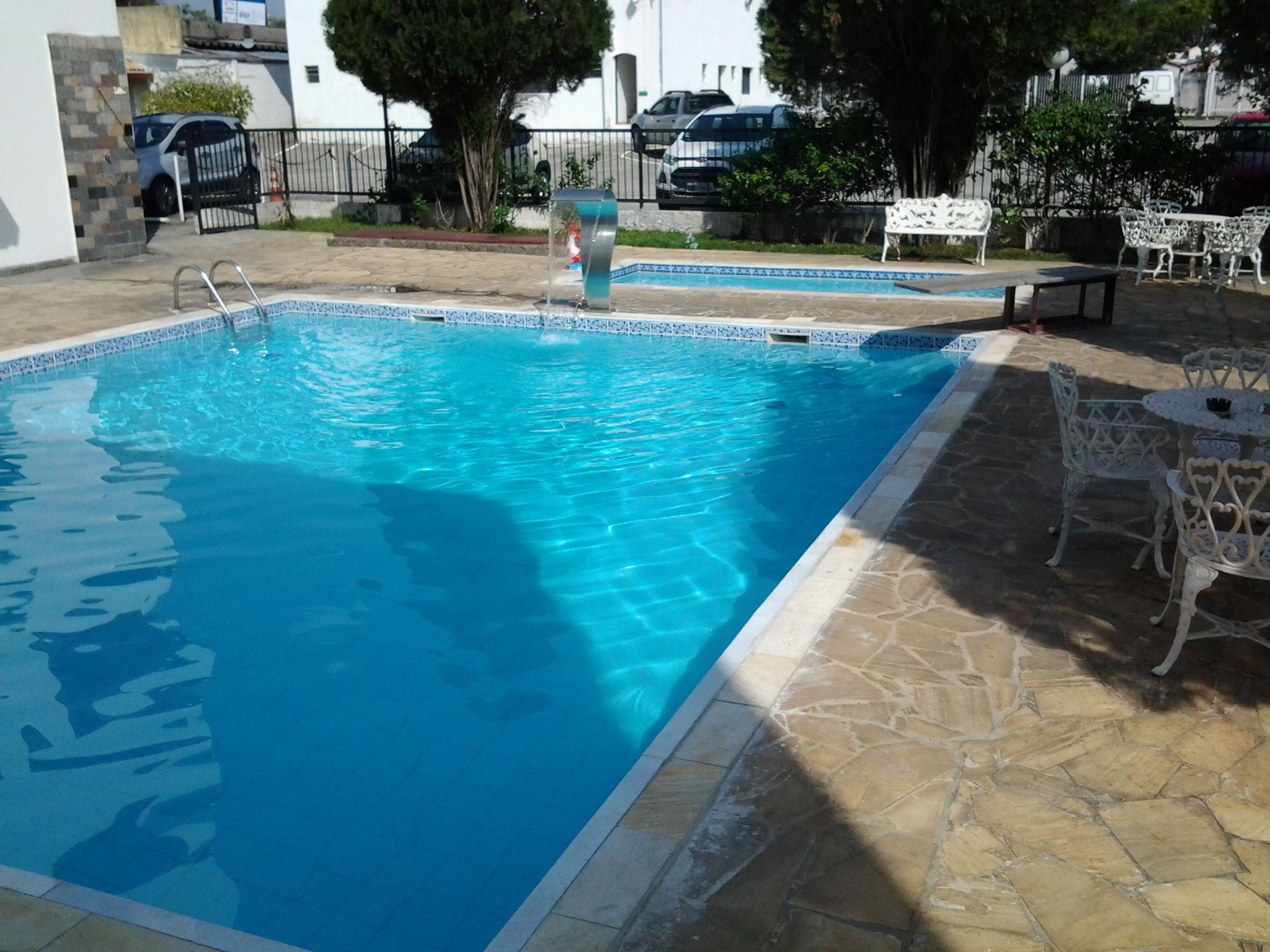 2 outdoor pools, pool umbrellas, pool loungers