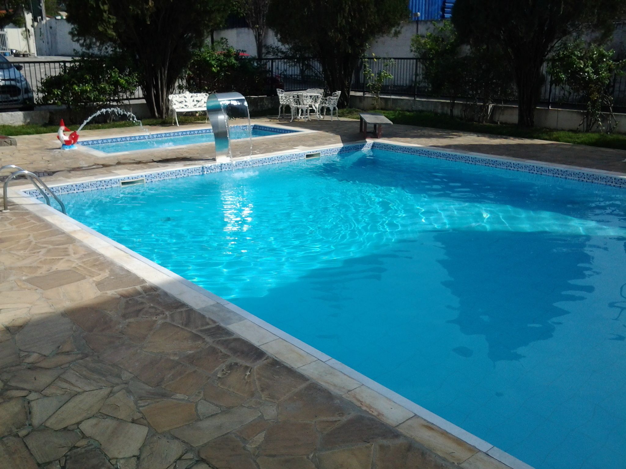 2 outdoor pools, pool umbrellas, pool loungers