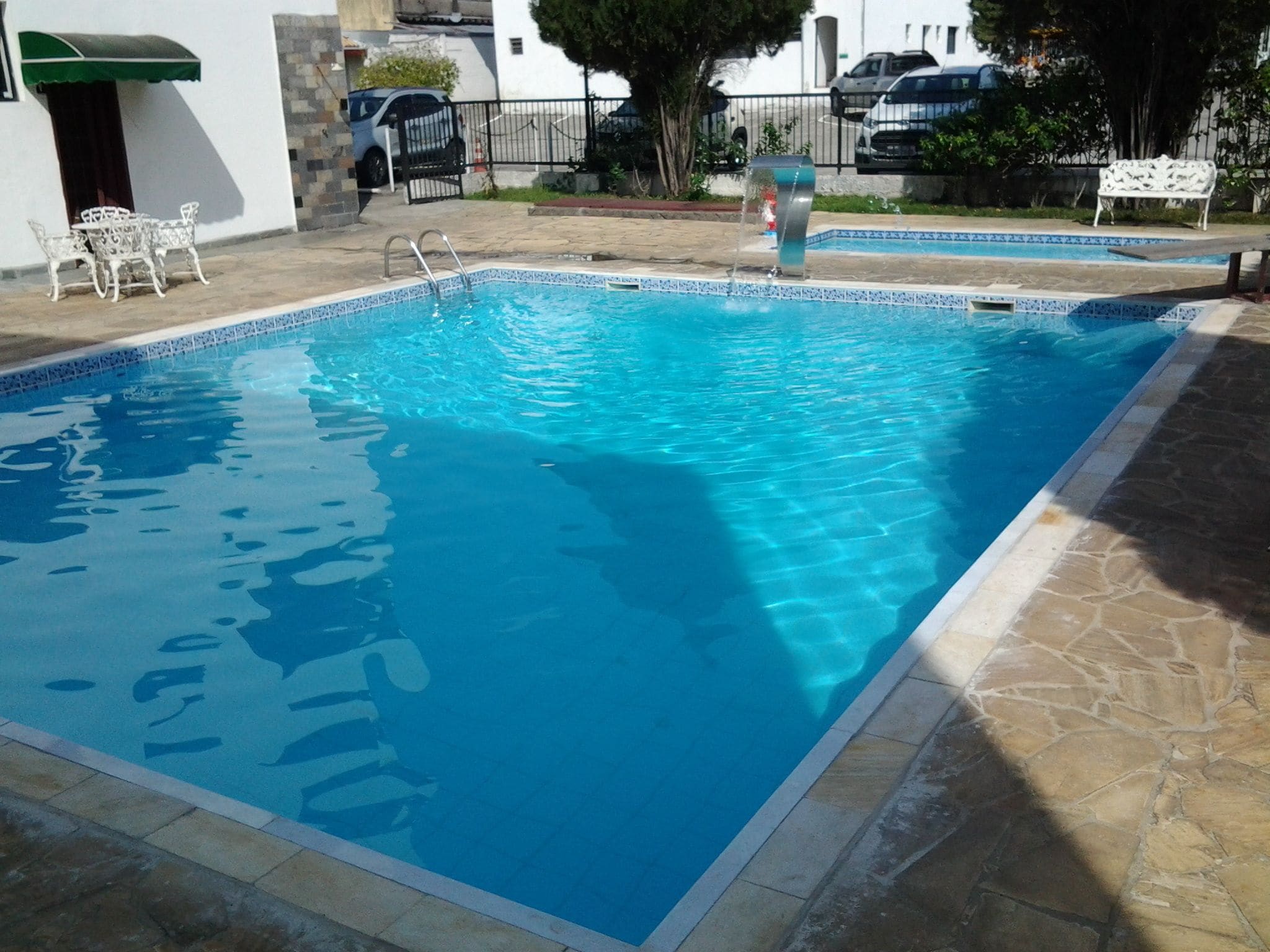 2 outdoor pools, pool umbrellas, pool loungers