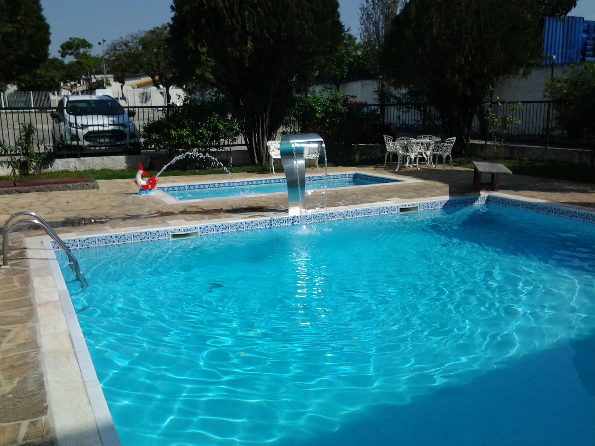 2 outdoor pools, pool umbrellas, pool loungers