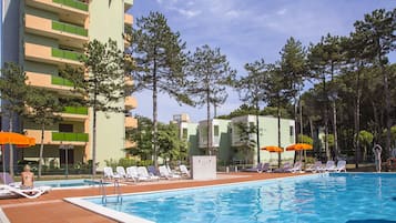 Seasonal outdoor pool, pool umbrellas, pool loungers