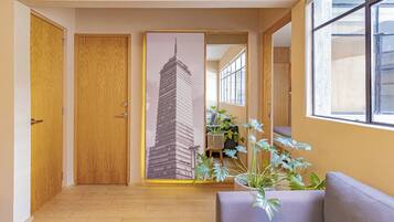 Comfort Apartment, 2 Bedrooms, Non Smoking | Living area | 55-inch Smart TV with digital channels, smart speakers