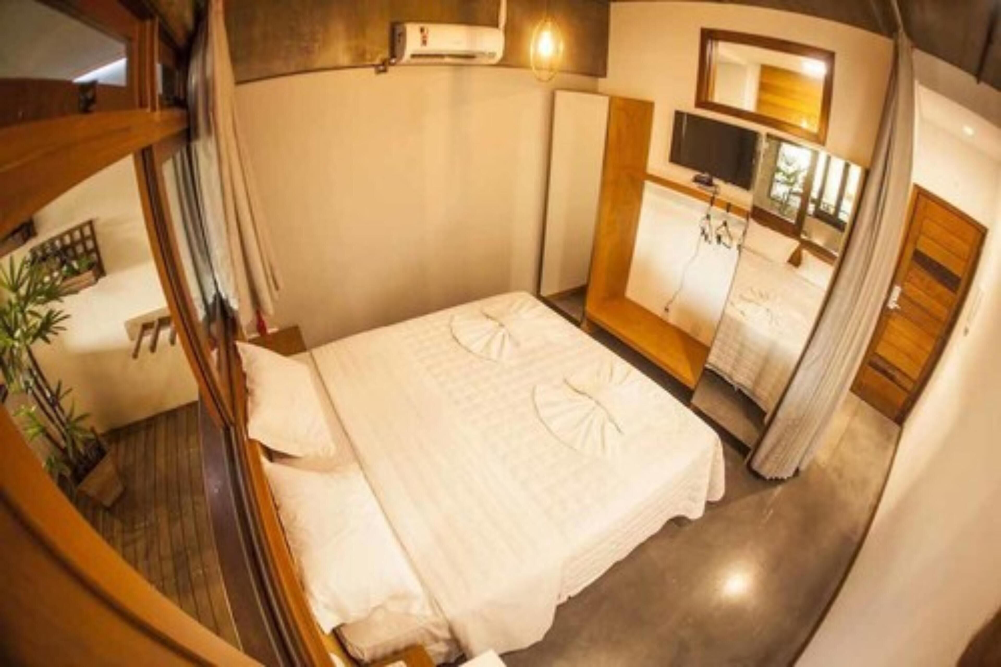 Frigobar, cofres nos quartos, quartos à prova de som, Wi-Fi de cortesia
