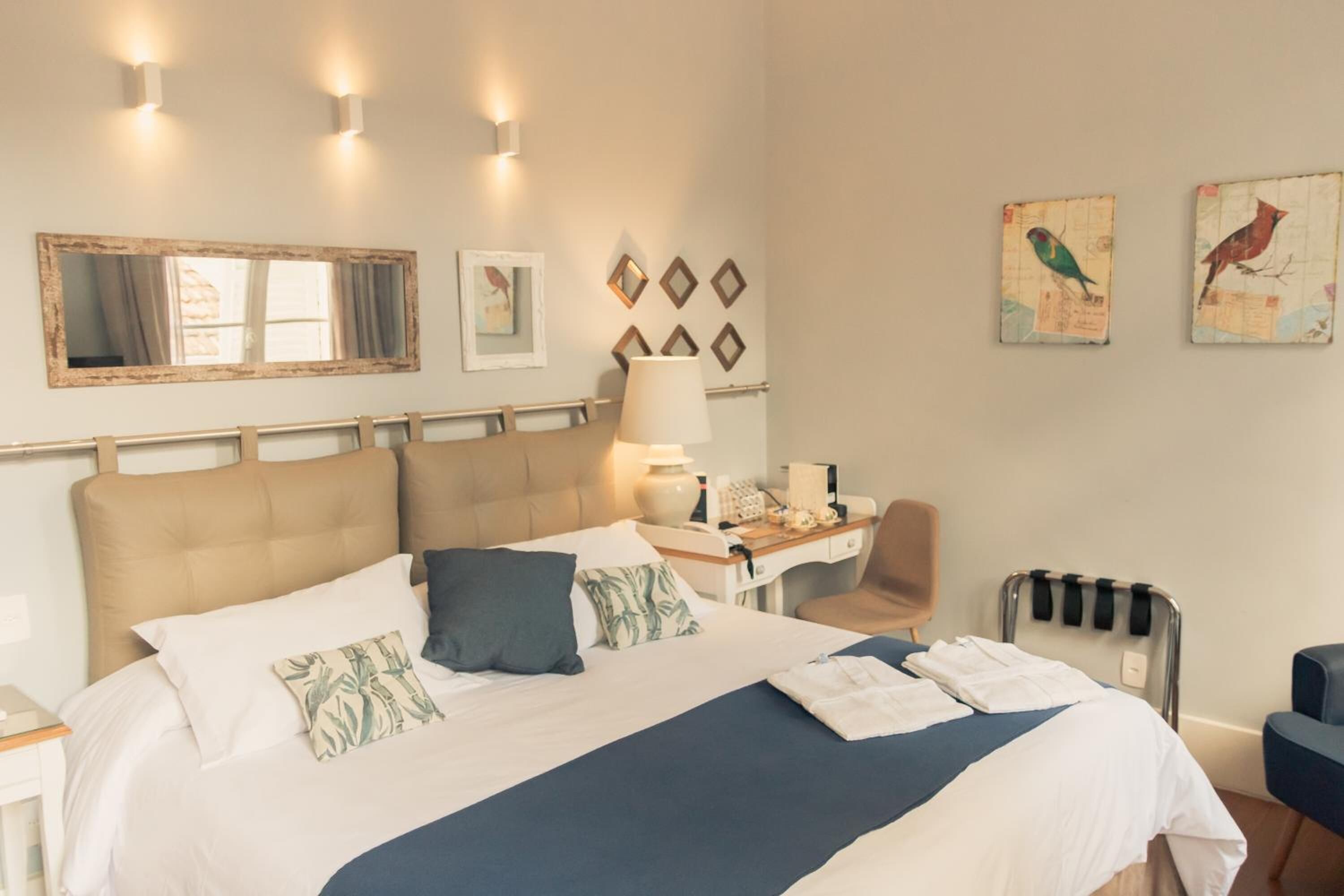 premium bedding, memory-foam beds, minibar, blackout curtains