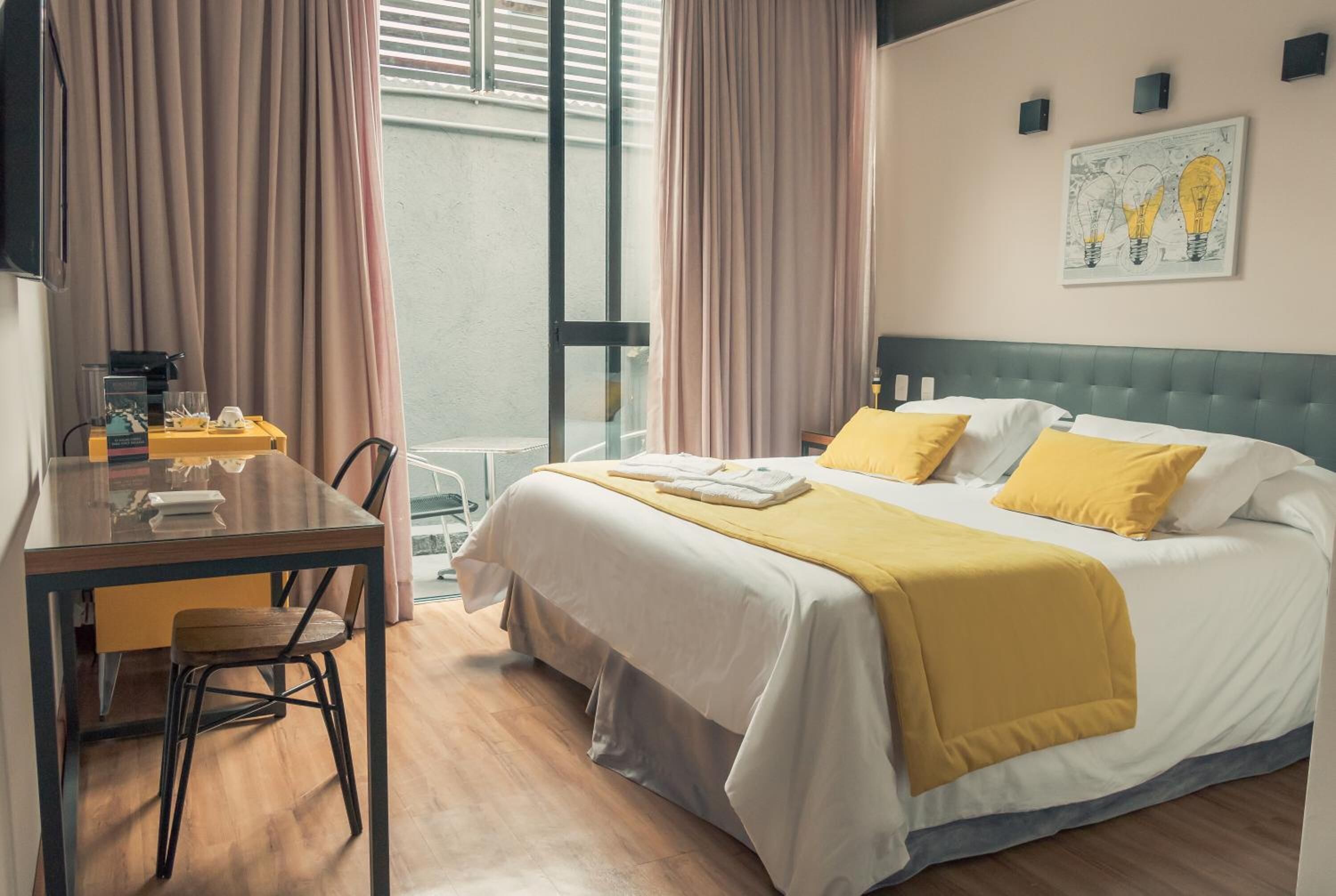 premium bedding, memory-foam beds, minibar, blackout curtains